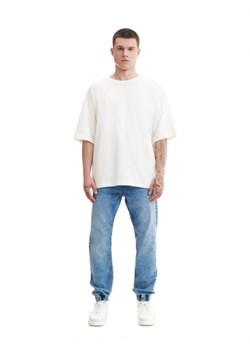 Cropp - Niebieskie jeansy jogger - niebieski ze sklepu Cropp w kategorii Jeansy męskie - zdjęcie 165503240
