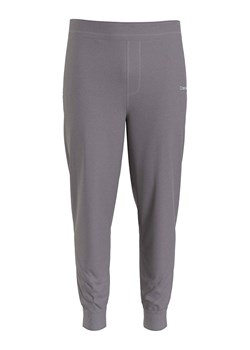 Calvin Klein Spodnie dresowe w kolorze szarym ze sklepu Limango Polska w kategorii Spodnie męskie - zdjęcie 165513701