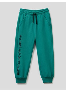Benetton Spodnie dresowe w kolorze zielonym ze sklepu Limango Polska w kategorii Spodnie chłopięce - zdjęcie 165576790