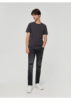 Jeansy slim fit z dziurami czarne ze sklepu House w kategorii Jeansy męskie - zdjęcie 165649592