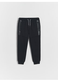 Reserved - Ocieplane spodnie dresowe - czarny ze sklepu Reserved w kategorii Spodnie chłopięce - zdjęcie 165893612