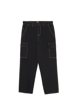 Cropp - Jeansy baggy z kieszeniami cargo - czarny ze sklepu Cropp w kategorii Spodnie męskie - zdjęcie 166110080