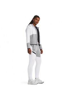 Damskie spodnie treningowe Under Armour Unstoppable Flc Jogger - białe ze sklepu Sportstylestory.com w kategorii Spodnie damskie - zdjęcie 166153260