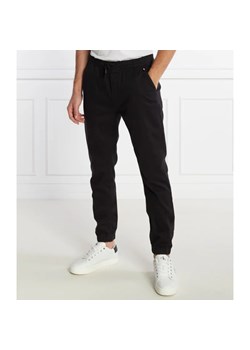 Tommy Jeans Spodnie jogger AUSTIN | Regular Fit ze sklepu Gomez Fashion Store w kategorii Spodnie męskie - zdjęcie 166188500