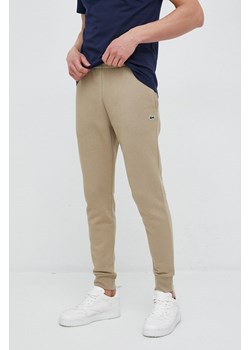 Lacoste spodnie dresowe męskie kolor brązowy gładkie XH9624-132 ze sklepu PRM w kategorii Spodnie męskie - zdjęcie 166193853