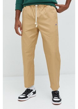 Champion spodnie męskie kolor beżowy proste 216544-TTP ze sklepu PRM w kategorii Spodnie męskie - zdjęcie 166193973