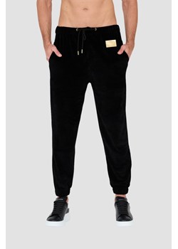 MOSCHINO Czarne welurowe spodnie dresowe, Wybierz rozmiar XS ze sklepu outfit.pl w kategorii Spodnie męskie - zdjęcie 166215870