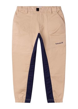 Timberland Spodnie w kolorze beżowym ze sklepu Limango Polska w kategorii Spodnie chłopięce - zdjęcie 166387702