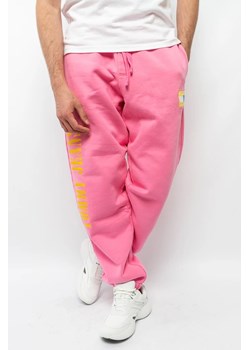 spodnie dresowe męskie tommy jeans dm0dm14931 różowy ze sklepu Royal Shop w kategorii Spodnie męskie - zdjęcie 166432630