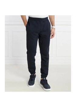 Tommy Hilfiger Spodnie dresowe GLOBAL STRIPE | Regular Fit ze sklepu Gomez Fashion Store w kategorii Spodnie męskie - zdjęcie 166592624