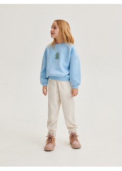 Reserved - Spodnie ze strukturalnej dzianiny - złamana biel ze sklepu Reserved w kategorii Spodnie dziewczęce - zdjęcie 166759830