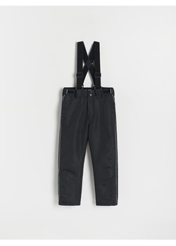 Reserved - Ocieplane spodnie z szelkami - czarny ze sklepu Reserved w kategorii Spodnie chłopięce - zdjęcie 167001083