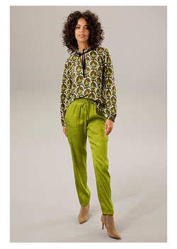 Aniston Spodnie w kolorze zielonym ze sklepu Limango Polska w kategorii Spodnie damskie - zdjęcie 167403210