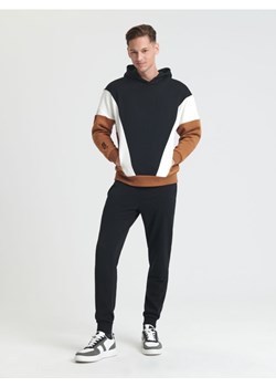 Sinsay - Spodnie dresowe slim jogger - czarny ze sklepu Sinsay w kategorii Spodnie męskie - zdjęcie 167417170
