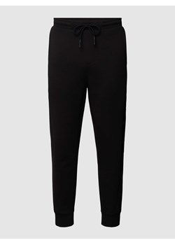Spodnie dresowe z nadrukiem z logo model ‘Helwyn’ ze sklepu Peek&Cloppenburg  w kategorii Spodnie męskie - zdjęcie 167678030
