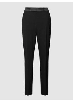 Spodnie materiałowe z aplikacją z logo ze sklepu Peek&Cloppenburg  w kategorii Spodnie damskie - zdjęcie 167678751