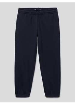 Spodnie dresowe z elastycznym ściągaczem ze sklepu Peek&Cloppenburg  w kategorii Spodnie chłopięce - zdjęcie 167810844