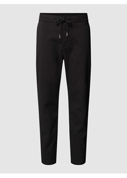 Chinosy z elastycznym pasem model ‘tapered’ ze sklepu Peek&Cloppenburg  w kategorii Spodnie męskie - zdjęcie 167810871