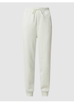Spodnie dresowe z mieszanki bawełny z dodatkiem materiału ekologicznego ze sklepu Peek&Cloppenburg  w kategorii Spodnie damskie - zdjęcie 167861980