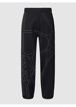 Spodnie dresowe o kroju regular fit w jednolitym kolorze ze sklepu Peek&Cloppenburg  w kategorii Spodnie męskie - zdjęcie 167933502