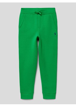 Spodnie dresowe z elastycznym pasem i tunelem ze sklepu Peek&Cloppenburg  w kategorii Spodnie chłopięce - zdjęcie 167935950
