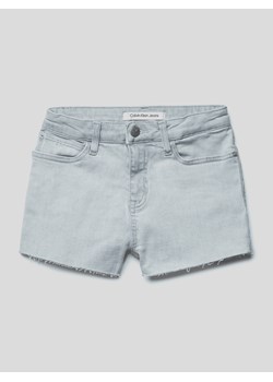 Szorty jeansowe z postrzępionym zakończeniem nogawek ze sklepu Peek&Cloppenburg  w kategorii Spodenki dziewczęce - zdjęcie 168088691