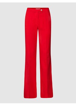 Spodnie materiałowe o rozkloszowanym kroju z kieszeniami z tyłu ze sklepu Peek&Cloppenburg  w kategorii Spodnie damskie - zdjęcie 168090694