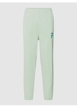 Spodnie dresowe z wyhaftowanym logo model ‘BADRA’ ze sklepu Peek&Cloppenburg  w kategorii Spodnie męskie - zdjęcie 168098502