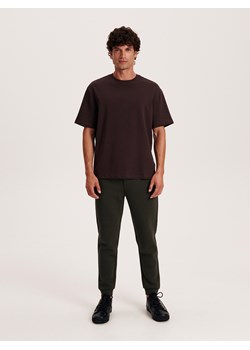 Reserved - Spodnie dresowe - ciemnozielony ze sklepu Reserved w kategorii Spodnie męskie - zdjęcie 168173910