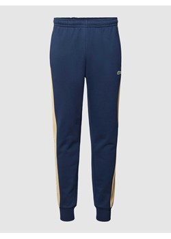 Spodnie dresowe w stylu Colour Blocking ze sklepu Peek&Cloppenburg  w kategorii Spodnie męskie - zdjęcie 168221960
