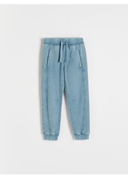 Reserved - Joggery z efektem sprania - niebieski ze sklepu Reserved w kategorii Spodnie chłopięce - zdjęcie 168266992