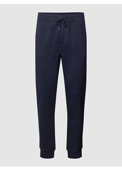 Spodnie dresowe z elastycznym pasem model ‘ATHLETIC’ ze sklepu Peek&Cloppenburg  w kategorii Spodnie męskie - zdjęcie 168274520