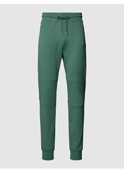Spodnie dresowe o kroju slim fit z elastycznym pasem i tunelem ze sklepu Peek&Cloppenburg  w kategorii Spodnie męskie - zdjęcie 168287412