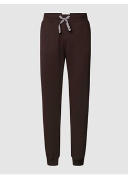 Spodnie dresowe z detalem z logo ze sklepu Peek&Cloppenburg  w kategorii Spodnie męskie - zdjęcie 168296283