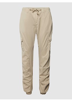 Spodnie sportowe z kieszeniami cargo w jednolitym kolorze ze sklepu Peek&Cloppenburg  w kategorii Spodnie męskie - zdjęcie 168305750