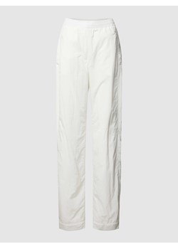 Spodnie treningowe w jednolitym kolorze z wpuszczanymi kieszeniami ze sklepu Peek&Cloppenburg  w kategorii Spodnie damskie - zdjęcie 168317404