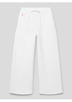 Spodnie dresowe z wyhaftowanym logo ze sklepu Peek&Cloppenburg  w kategorii Spodnie dziewczęce - zdjęcie 168324674