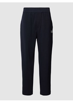 Spodnie dresowe z naszywką z logo ze sklepu Peek&Cloppenburg  w kategorii Spodnie męskie - zdjęcie 168324810