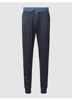 Spodnie od piżamy ze wzorem w kontrastowym kolorze model ‘DEEPSLEEPWEAR’ ze sklepu Peek&Cloppenburg  w kategorii Piżamy męskie - zdjęcie 168331150