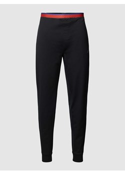 Spodnie od piżamy z elastycznym pasem w kontrastowych kolorach ze sklepu Peek&Cloppenburg  w kategorii Piżamy męskie - zdjęcie 168336192
