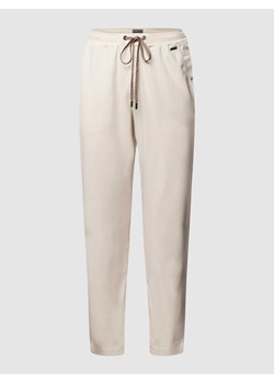 Spodnie dresowe z aplikacją z logo ze sklepu Peek&Cloppenburg  w kategorii Spodnie męskie - zdjęcie 168343623