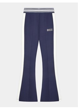 Guess Spodnie materiałowe J3YB09 KAE30 Niebieski Regular Fit ze sklepu MODIVO w kategorii Spodnie dziewczęce - zdjęcie 168386192