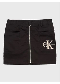 Calvin Klein Jeans Spódnica Monogram Off Placed IG0IG01824 Czarny Regular Fit ze sklepu MODIVO w kategorii Spódnice dziewczęce - zdjęcie 168388152