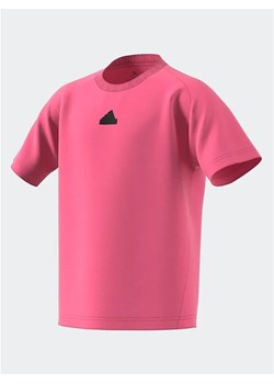 adidas T-Shirt IB3985 Różowy Regular Fit ze sklepu MODIVO w kategorii T-shirty chłopięce - zdjęcie 168401301