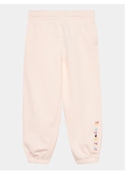 Tommy Hilfiger Spodnie dresowe KG0KG07232 M Różowy Regular Fit ze sklepu MODIVO w kategorii Spodnie dziewczęce - zdjęcie 168401784