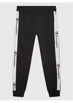 Champion Spodnie dresowe 404471 Czarny Regular Fit ze sklepu MODIVO w kategorii Spodnie chłopięce - zdjęcie 168402010