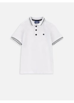 Coccodrillo Polo ZC3143603EJB Biały Regular Fit ze sklepu MODIVO w kategorii T-shirty chłopięce - zdjęcie 168406942