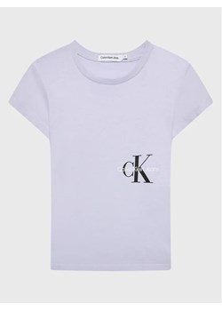Calvin Klein Jeans T-Shirt Monogram Off Placed IG0IG01545 Fioletowy Slim Fit ze sklepu MODIVO w kategorii Bluzki dziewczęce - zdjęcie 168416672