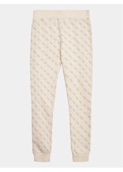 Guess Spodnie dresowe J3YQ19 KA6R3 Biały Regular Fit ze sklepu MODIVO w kategorii Spodnie dziewczęce - zdjęcie 168419414