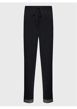 Femilet by Chantelle Spodnie piżamowe Jazz FNA560 Czarny Regular Fit ze sklepu MODIVO w kategorii Piżamy damskie - zdjęcie 168422560